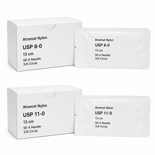 Imagen ilustrativa optimizada: Atramat Nylon negro, variantes USP 8-0 SE-6 y USP 11-0 SE-4, ambas de 13 cm y 3/8 de círculo, sobre fondo blanco