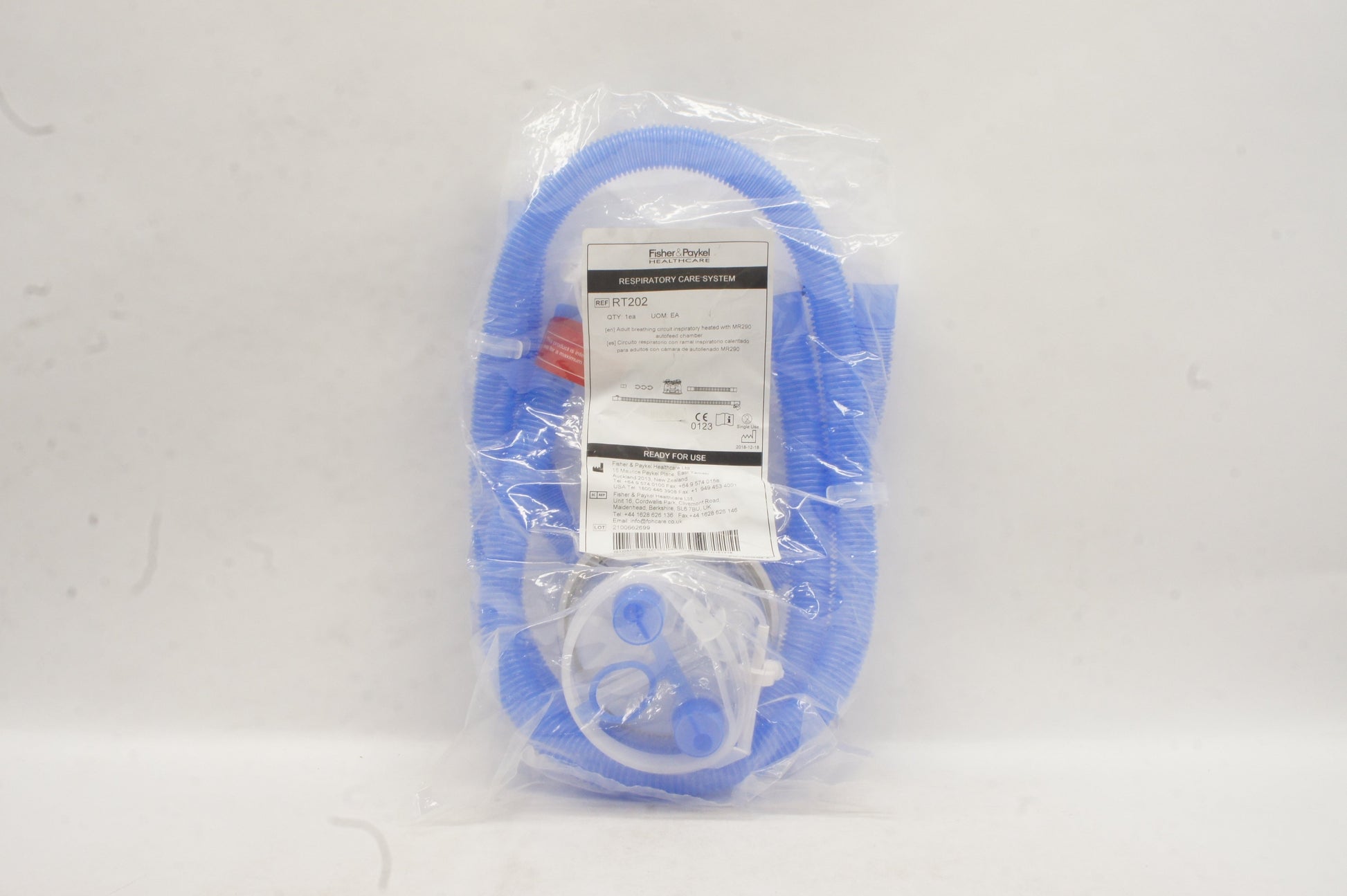 Empaque estéril del circuito respiratorio adulto Fisher & Paykel, etiqueta REF RT202, con rama inspiratoria calefactada y cámara MR290