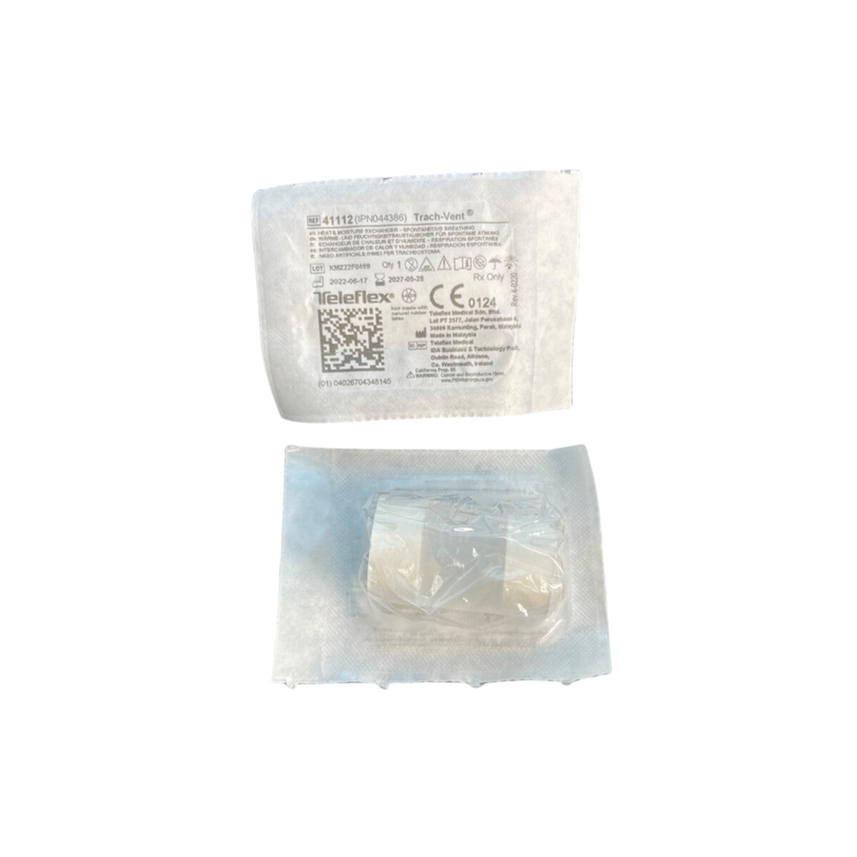 Hudson RCI 41112 Trach-Vent HME, dispositivo individual empacado para traqueostomía sobre fondo blanco