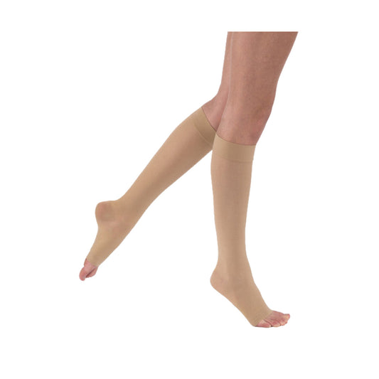 Medias de compresión Jobst UltraSheer a la rodilla punta abierta 15-20 mmHg sobre fondo blanco