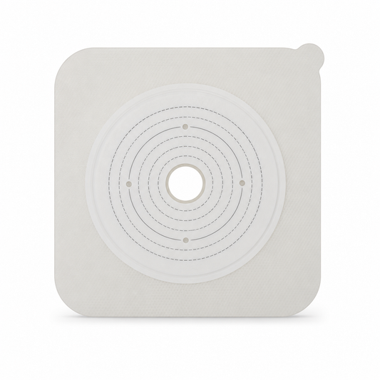 Imagen ilustrativa optimizada: Barrera plana Ostomed del equipo completo de ostomía, aro de 70 mm, sobre fondo blanco