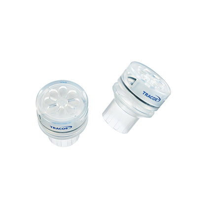 Válvula fonatoria TRACOE Phon Assist I REF 650-T transparente con conector de 15 mm y orificios laterales, sobre fondo blanco